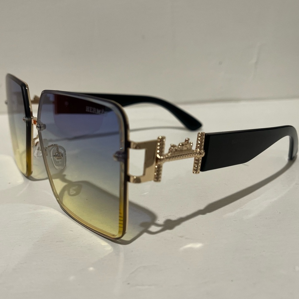 Hermes Sunglasses with Gold and Black Accents